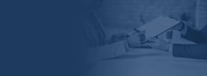 Person signing document with navy color overlay